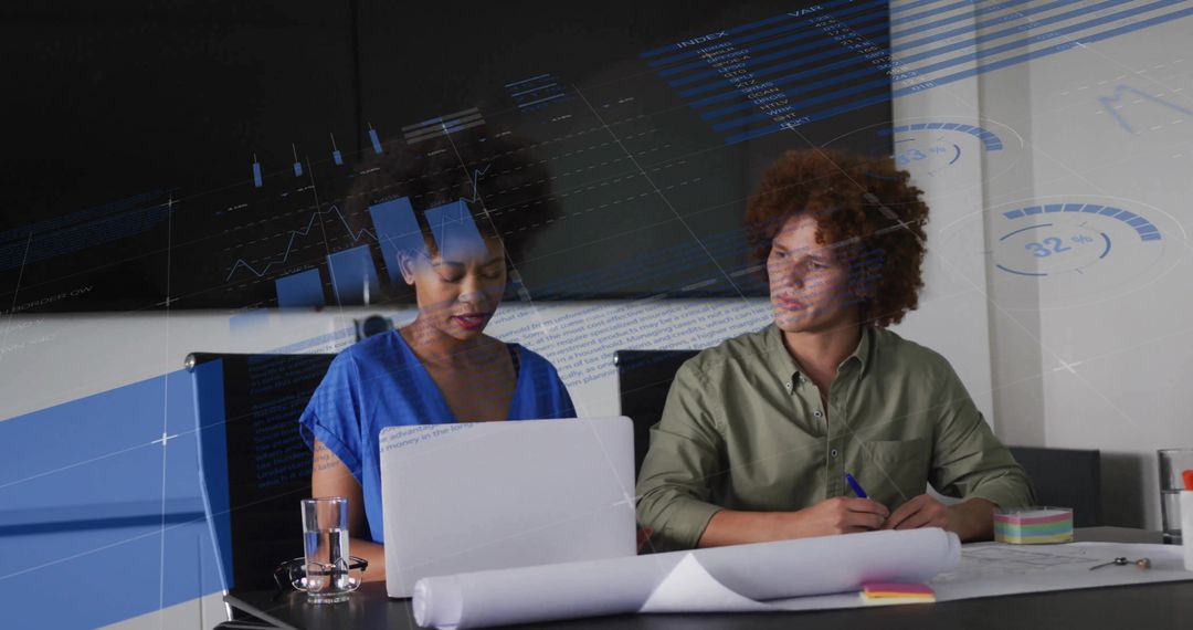 Business Team Reviewing Data Charts and Plans in Office Meeting