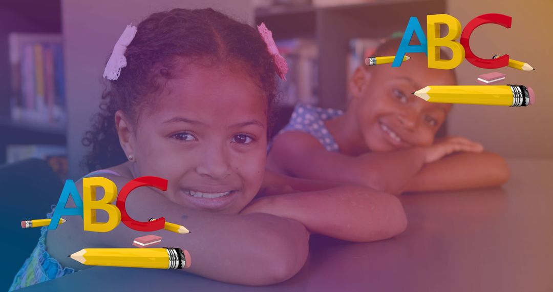 Smiling Diverse Girls Learning at School Desk