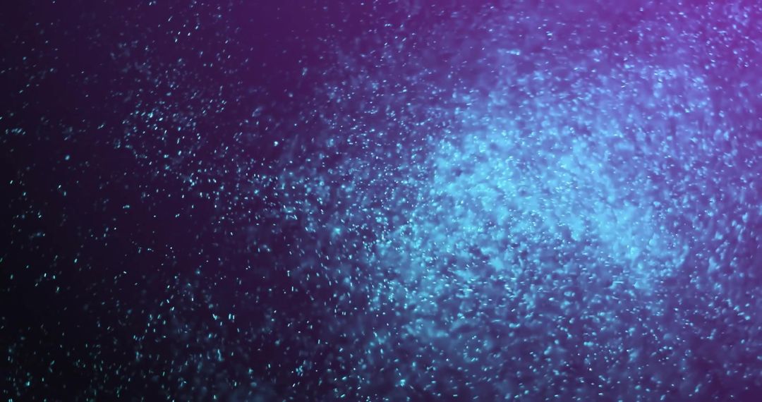 Blue Glowing Particles on Vibrant Purple Gradient