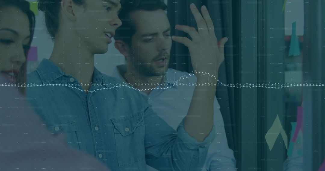 Team Collaboration in Modern Office with Data Analysis Overlay