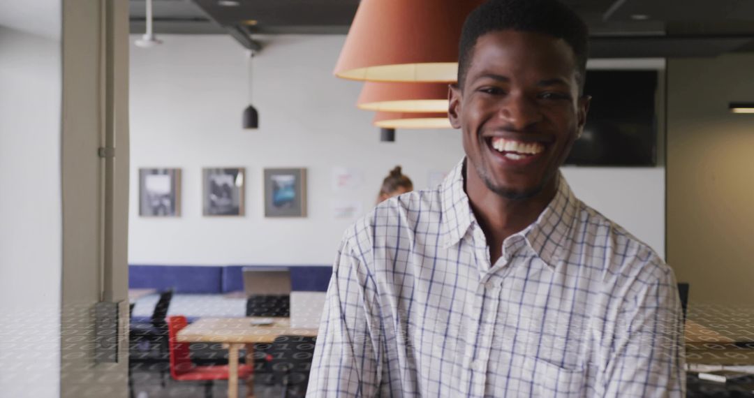 Smiling Professional in Contemporary Office Environment