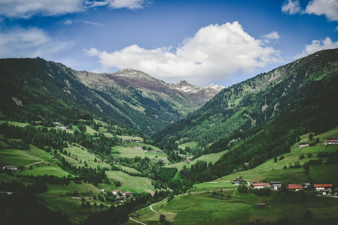 Peaceful Alpine Valley with Small Village - Free Images, Stock Photos and Pictures on Pikwizard.com