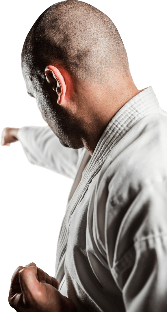 Bald Fighter Executing Powerful Karate Punch Transparent Background