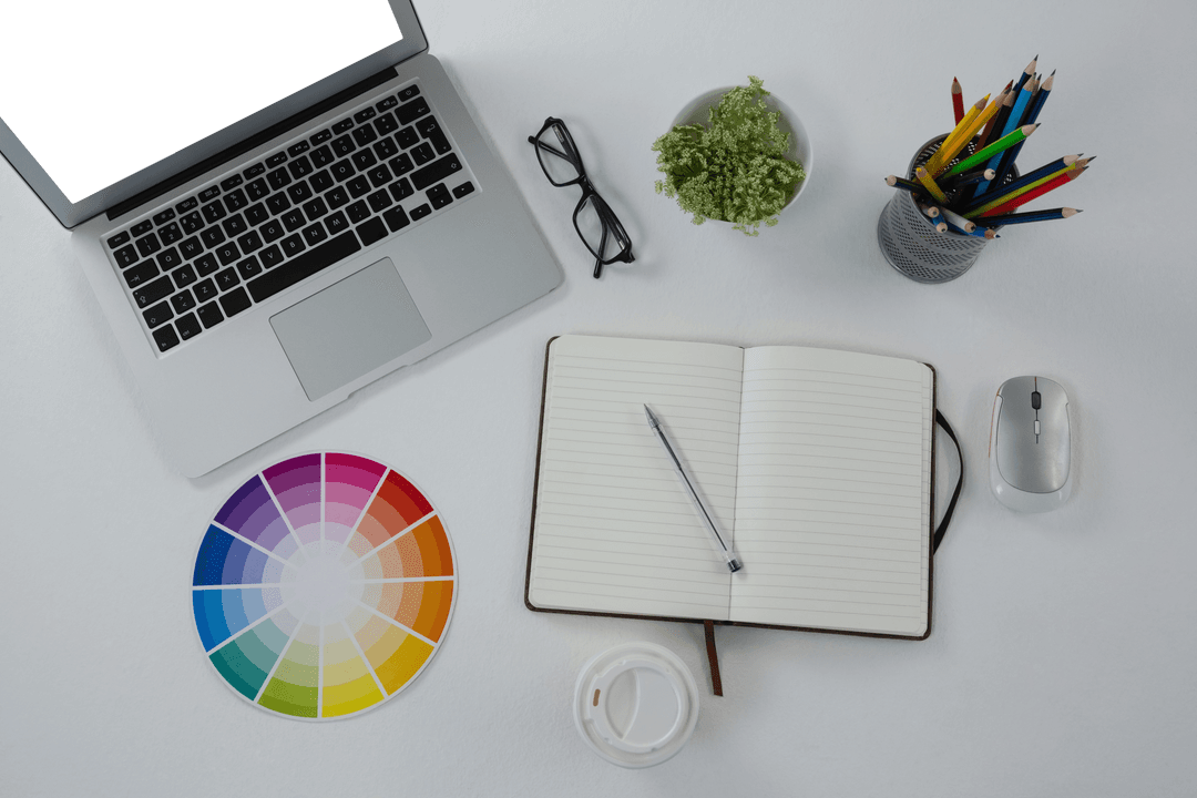 Transparent Workspace with Laptop and Color Tools Overhead