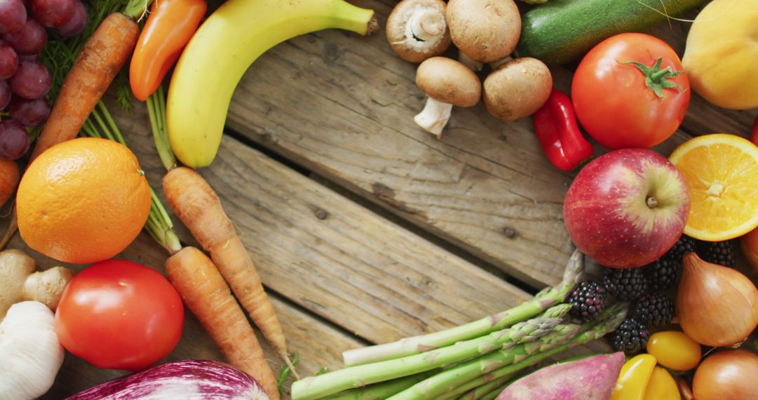 Colorful Fresh Fruits and Vegetables on Wooden Surface - Free Images, Stock Photos and Pictures on Pikwizard.com