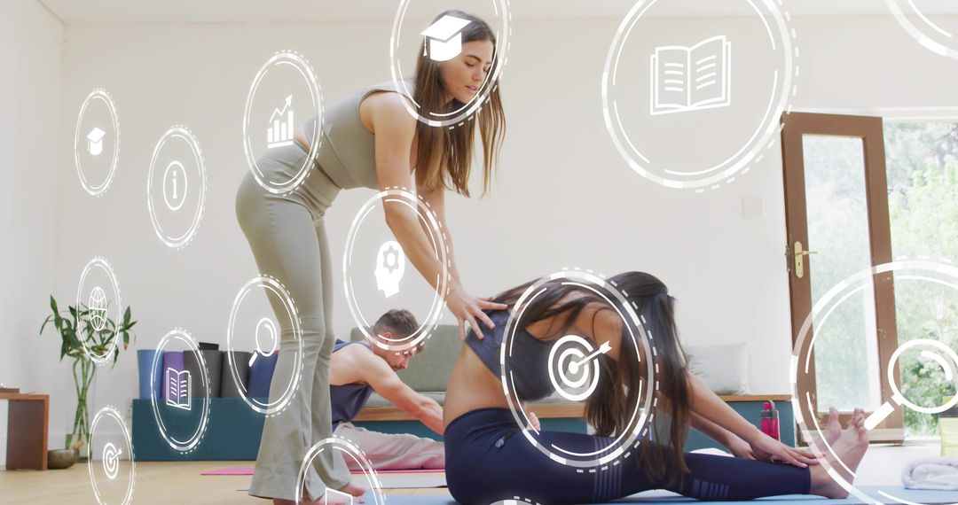 Yoga Instructor Guiding Student Through Seated Forward Fold in Minimalist Home Studio