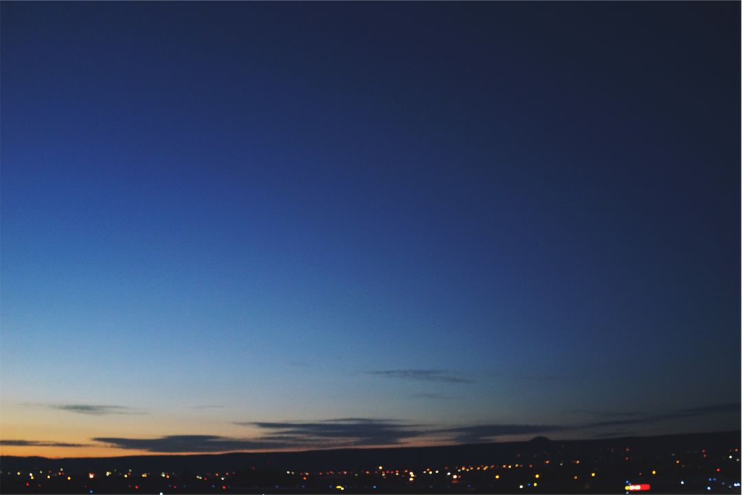 Dramatic Nightfall Over Cityscape with Subtle Skyline - Free Images, Stock Photos and Pictures on Pikwizard.com