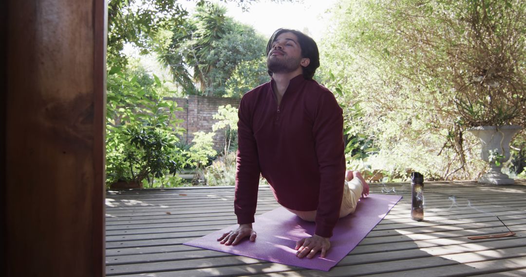 Man Practicing Outdoor Yoga on Wooden Deck - Free Images, Stock Photos and Pictures on Pikwizard.com