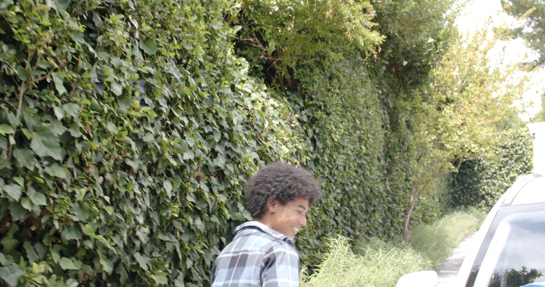 Joyful Teen Enjoying Adventure in Lush Garden