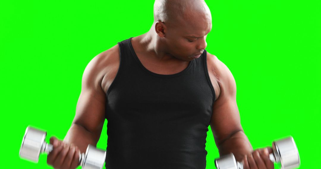 Fitness Enthusiast Exercising with Dumbbells on Green Screen Background - Free Images, Stock Photos and Pictures on Pikwizard.com