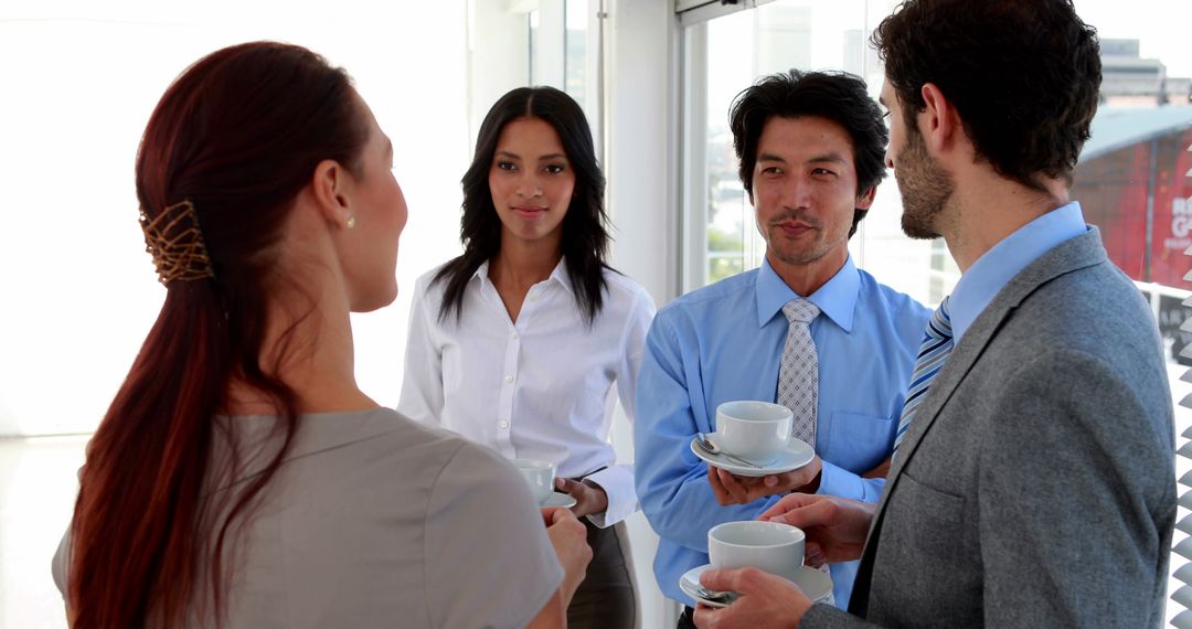 Business Team Socializing during Coffee Break - Free Images, Stock Photos and Pictures on Pikwizard.com