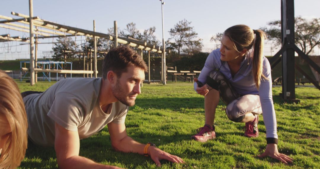 Personal Trainer Coaching Man During Outdoor Workout - Free Images, Stock Photos and Pictures on Pikwizard.com