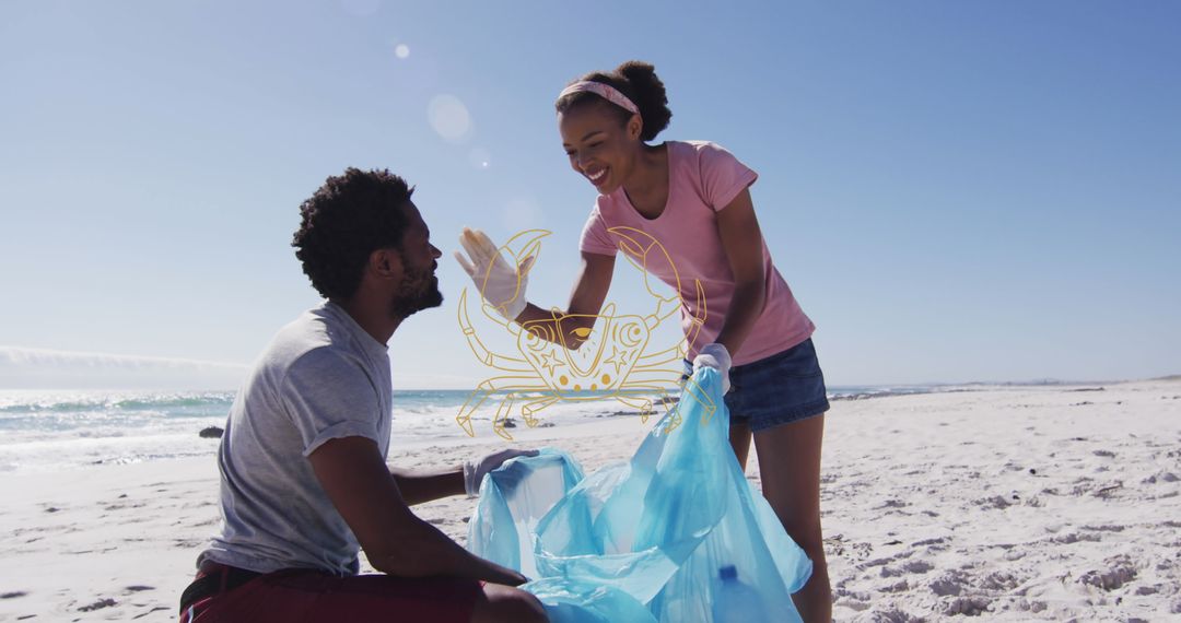 Volunteers Engaging in Beach Cleanup While Smiling and High-Fiving