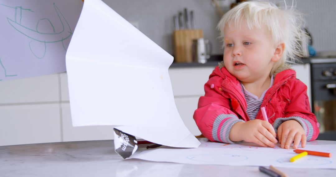 Toddler Drawing with Parent Help in Modern Kitchen at Home
