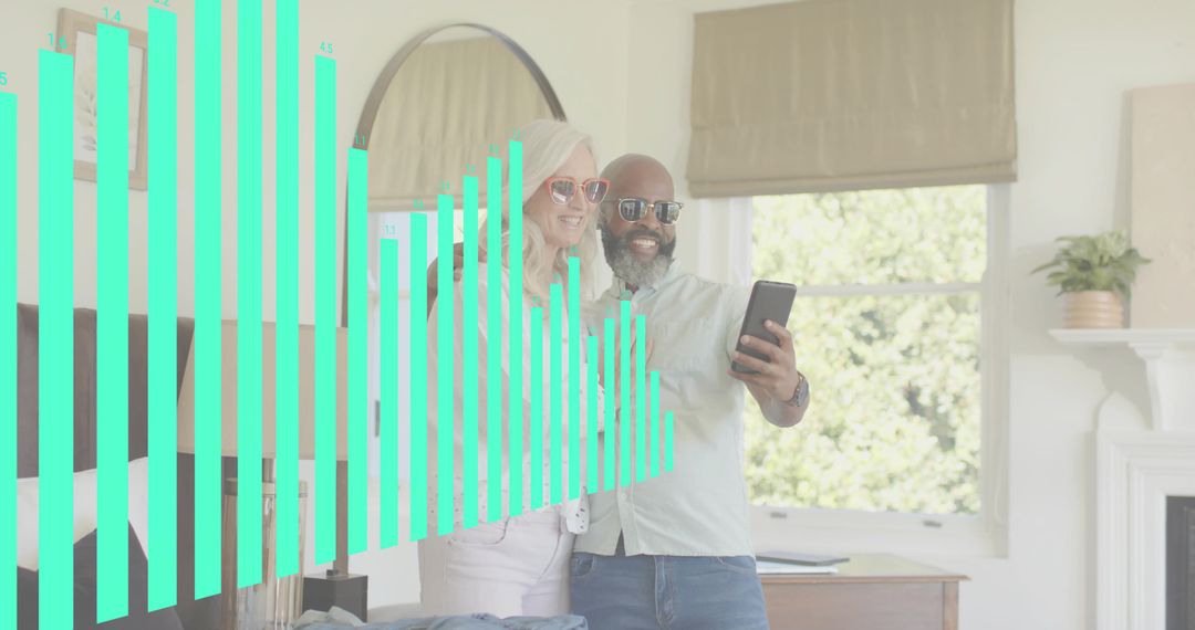 Senior Couple Taking Smartphone Selfie in Bright Bedroom with Teal Data Chart Overlay