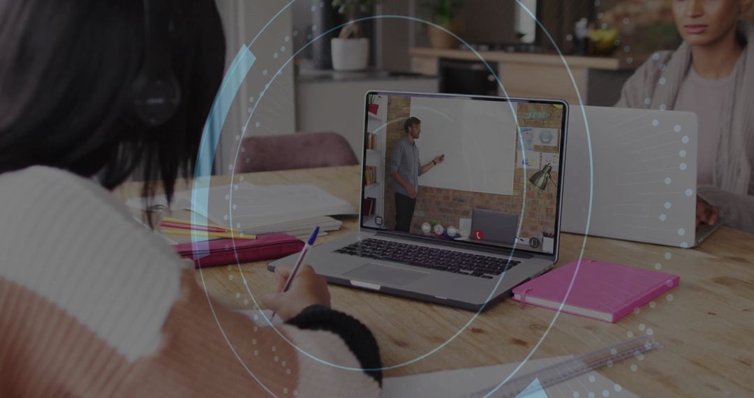 Teenagers Taking Online Lessons and Writing Notes at Home