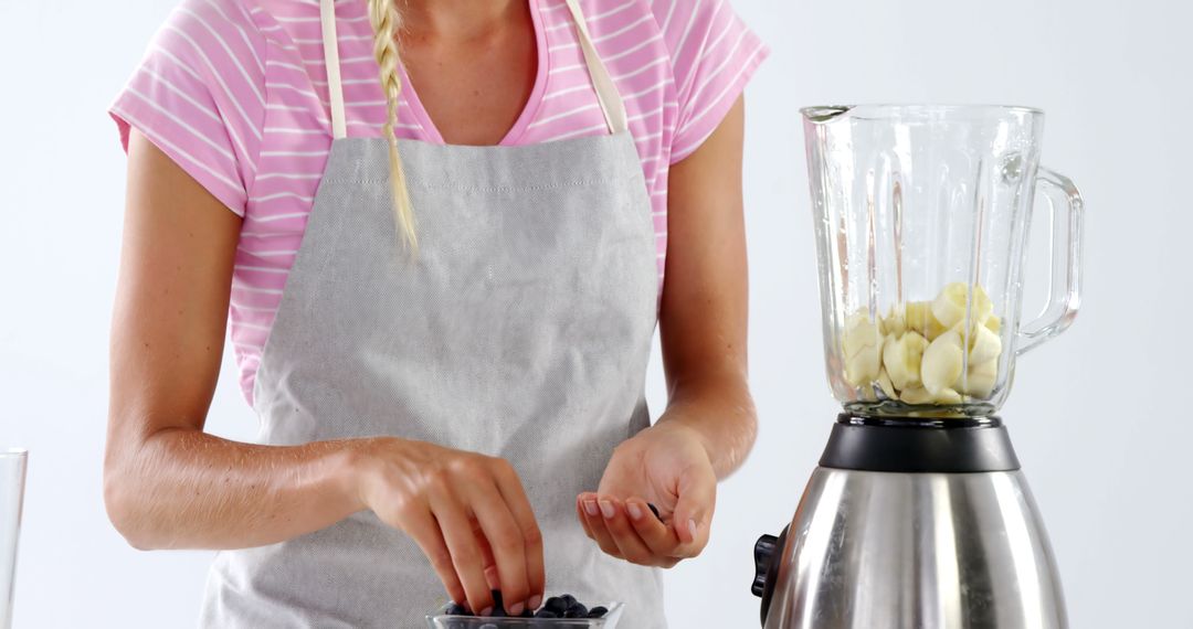 Woman Preparing Healthy Smoothie with Blender - Free Images, Stock Photos and Pictures on Pikwizard.com