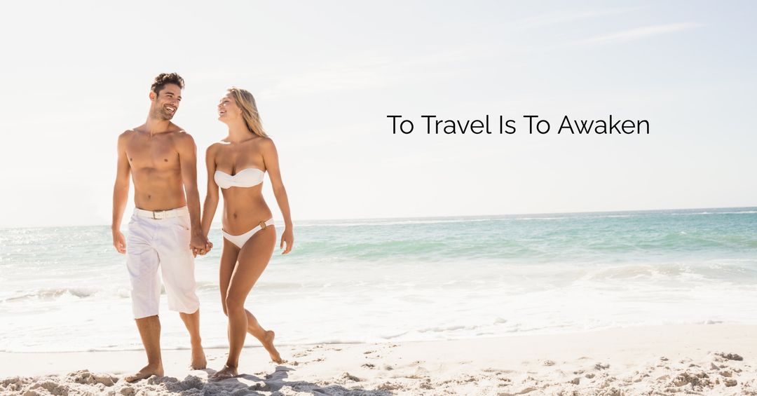 Couple Enjoying a Walk on Sunlit Beach