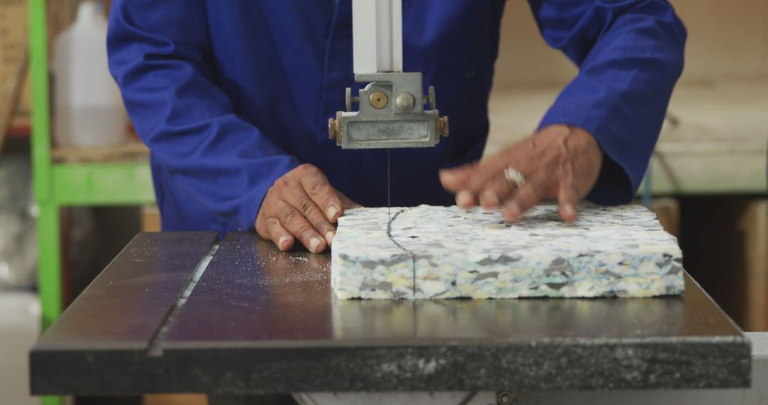 Worker using band saw to cut recycled material - Free Images, Stock Photos and Pictures on Pikwizard.com