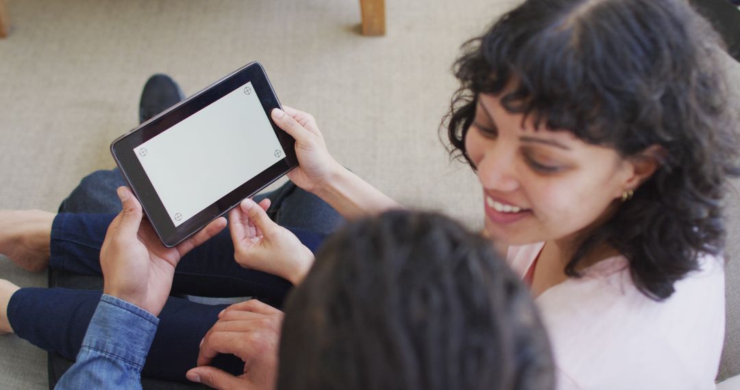 Couple Relaxing Together Use Tablet in Living Room