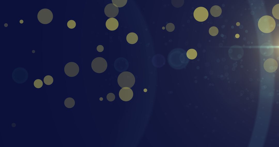 Abstract Golden Lights and Bokeh on Deep Blue Background