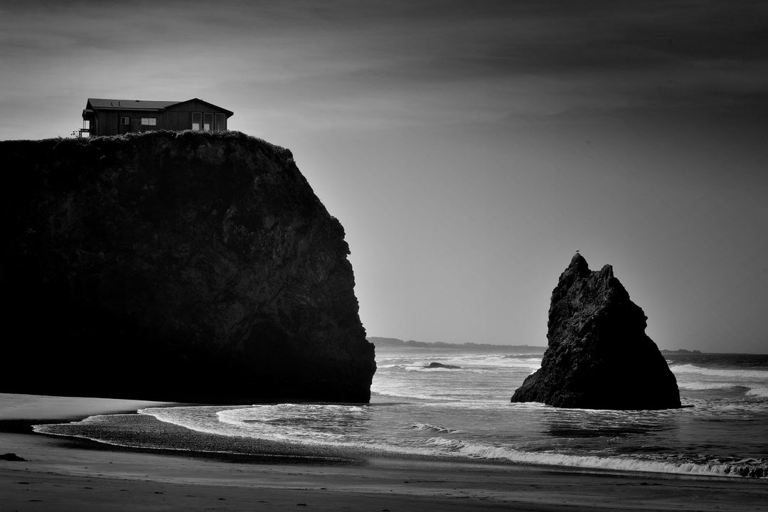 Secluded Beach House on Cliff at Dawn in Black and White - Free Images, Stock Photos and Pictures on Pikwizard.com