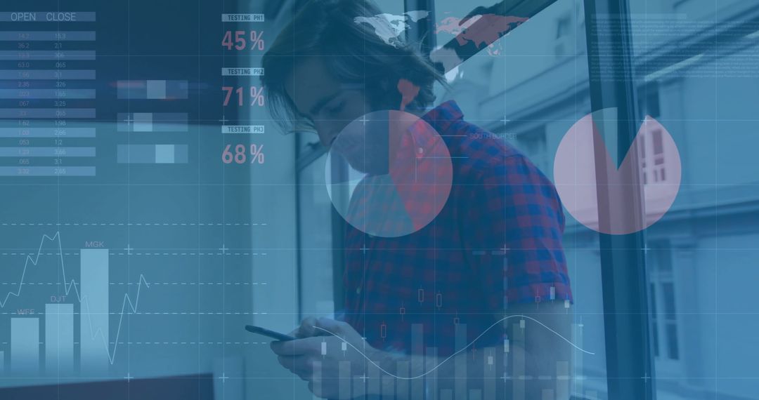 Businessman Analyzing Financial Data Overlaying Mobile Device