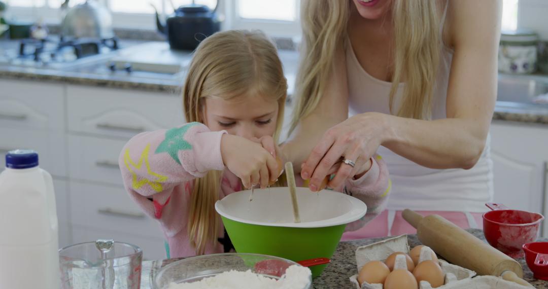 Caucasian Mother and Daughter Preparing Dough Together in Home Kitchen - Free Images, Stock Photos and Pictures on Pikwizard.com