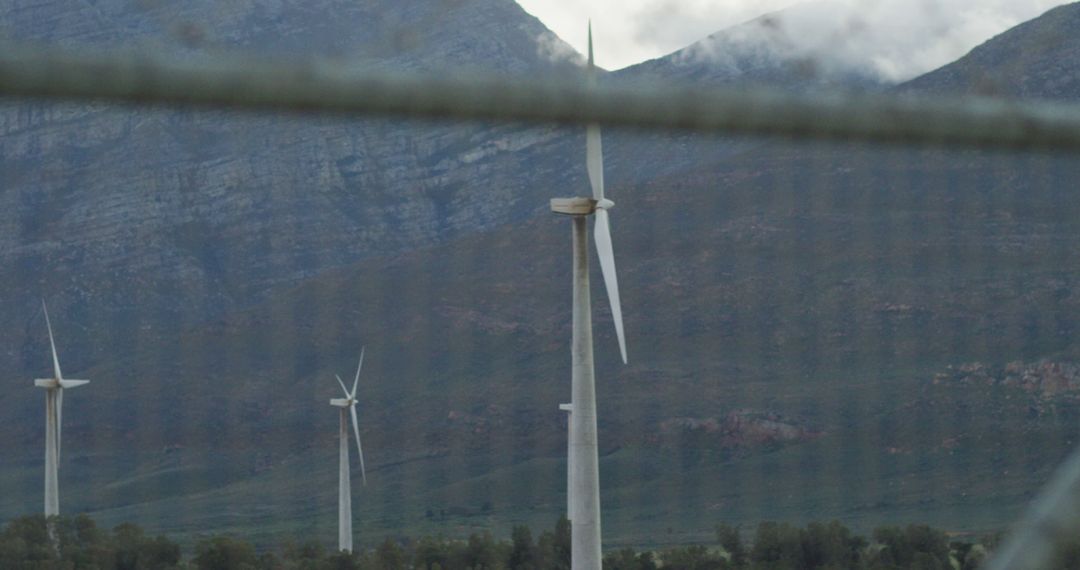 Wind Turbines Generating Renewable Energy in Mountainous Area - Free Images, Stock Photos and Pictures on Pikwizard.com