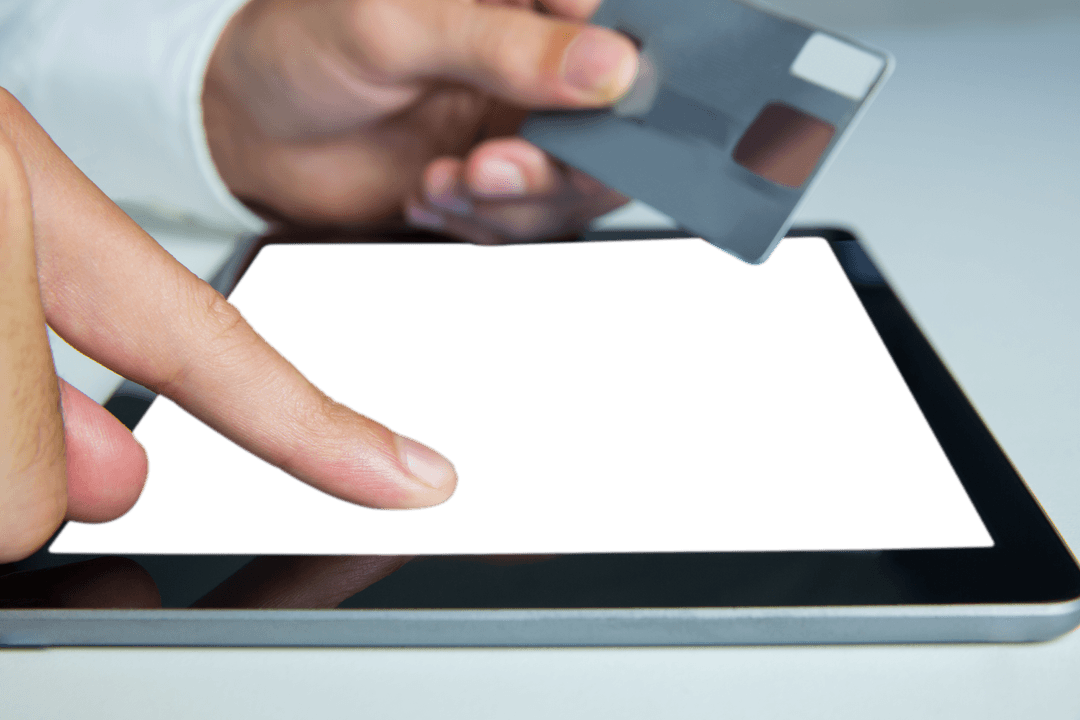 Hands Using Tablet Device with Credit Card on Transparent Background