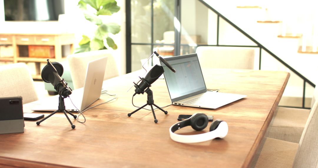 Modern Podcasting Setup on Wooden Table in Bright Workspace