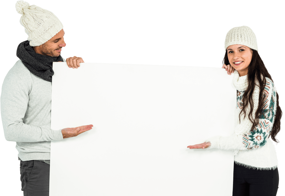 Smiling Couple Holding Transparent White Placard in Winter Outfit