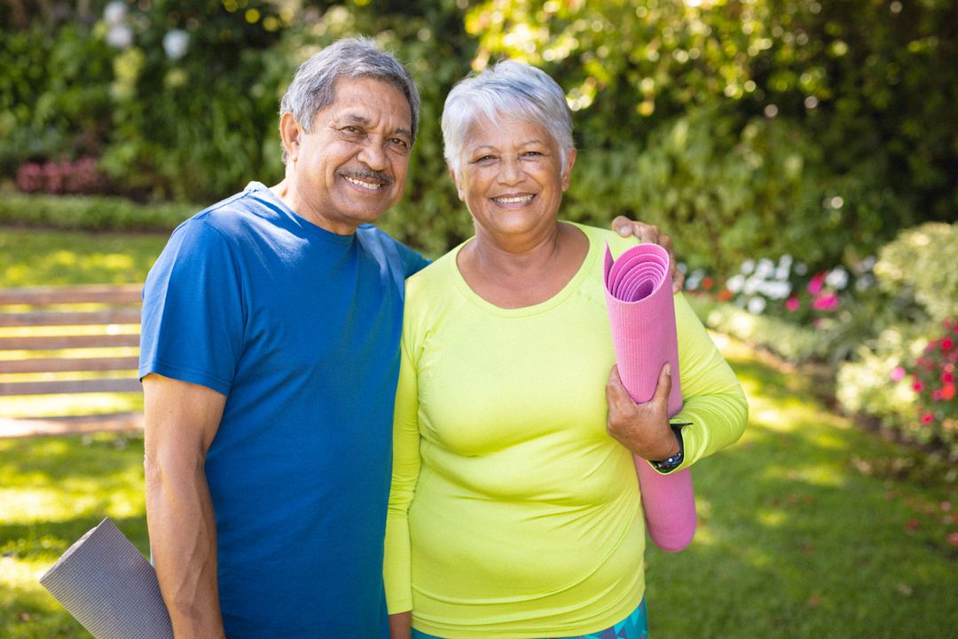 Smiling Senior Couple with Exercise Mats in Park - Free Images, Stock Photos and Pictures on Pikwizard.com