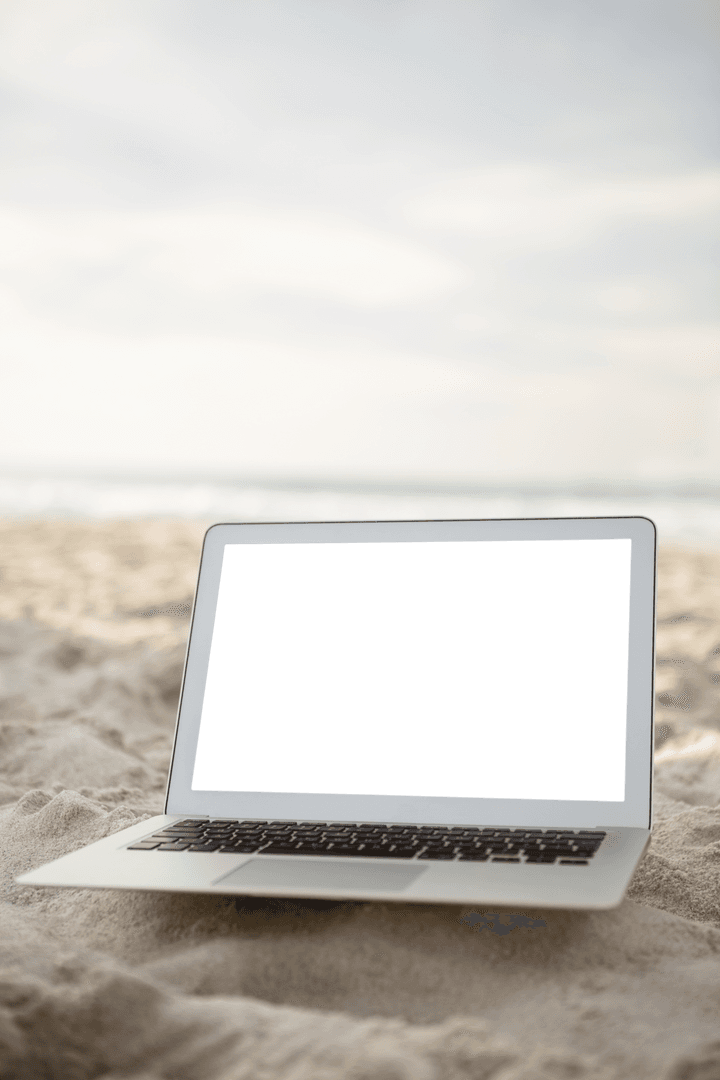 Transparent Laptop on Beach Sand Background for Creative Projects