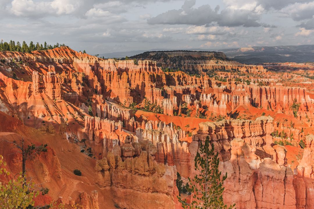Stunning Bryce Canyon Landscape with Hoodoos and Dramatic Sky - Free Images, Stock Photos and Pictures on Pikwizard.com