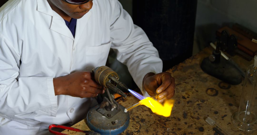 Scientist Performing Glassblowing Experiment in Laboratory - Free Images, Stock Photos and Pictures on Pikwizard.com