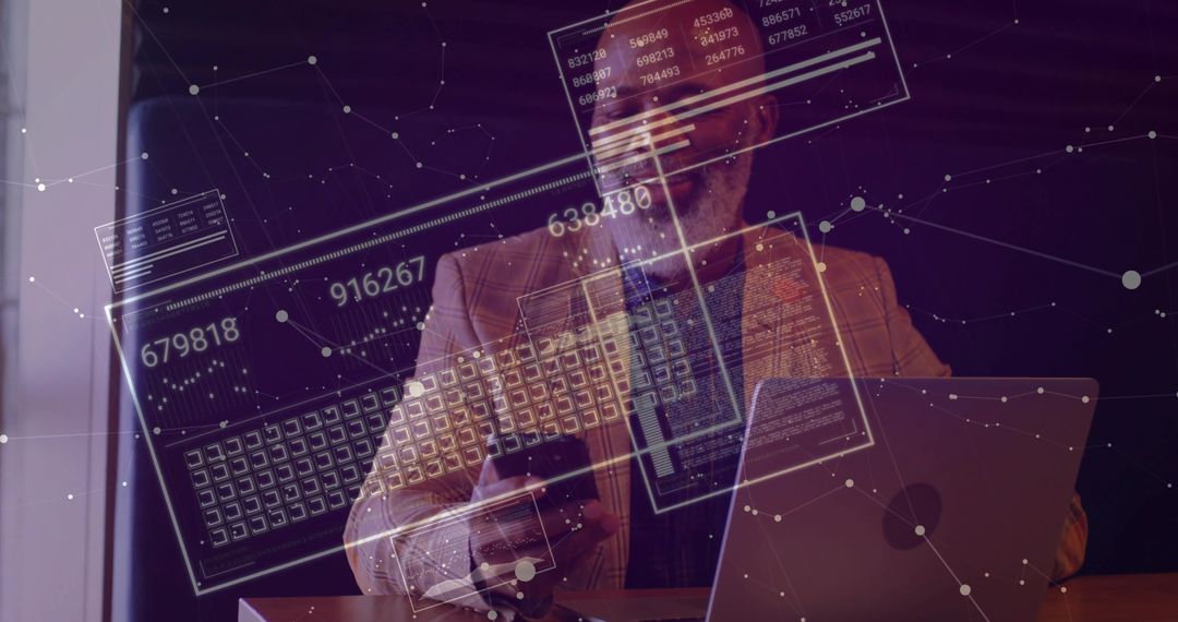 Cybersecurity Expert Viewing Data on Laptop with Augmented Reality Display