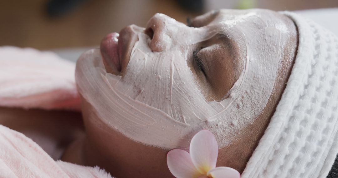 Woman Enjoying Facial Treatment with Clay Masque in Spa - Free Images, Stock Photos and Pictures on Pikwizard.com