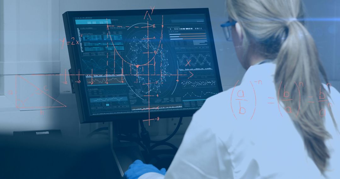 scientist analyzing complex data on computer screen in laboratory setting - Free Images, Stock Photos and Pictures on Pikwizard.com