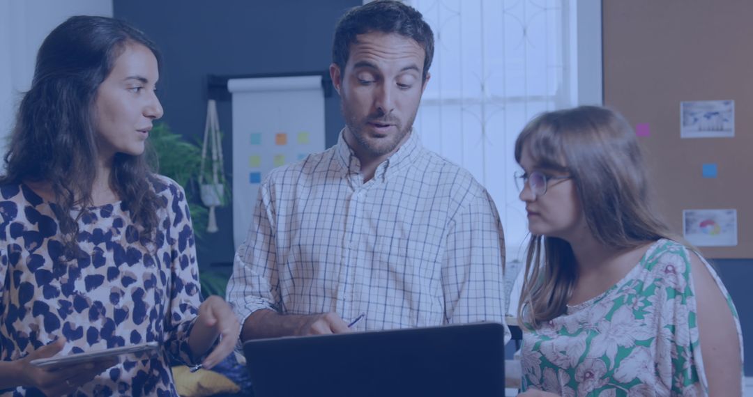 Collaborative Team Discussing Data Insights in Office Setting