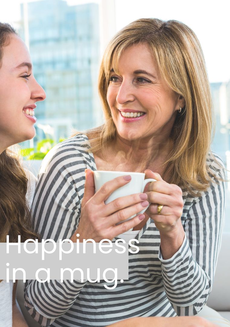Smiling Women Enjoying Coffee Together in Sunlit Room