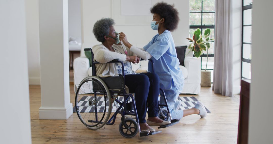 Nurse Assisting Elderly Woman in Wheelchair at Home - Free Images, Stock Photos and Pictures on Pikwizard.com