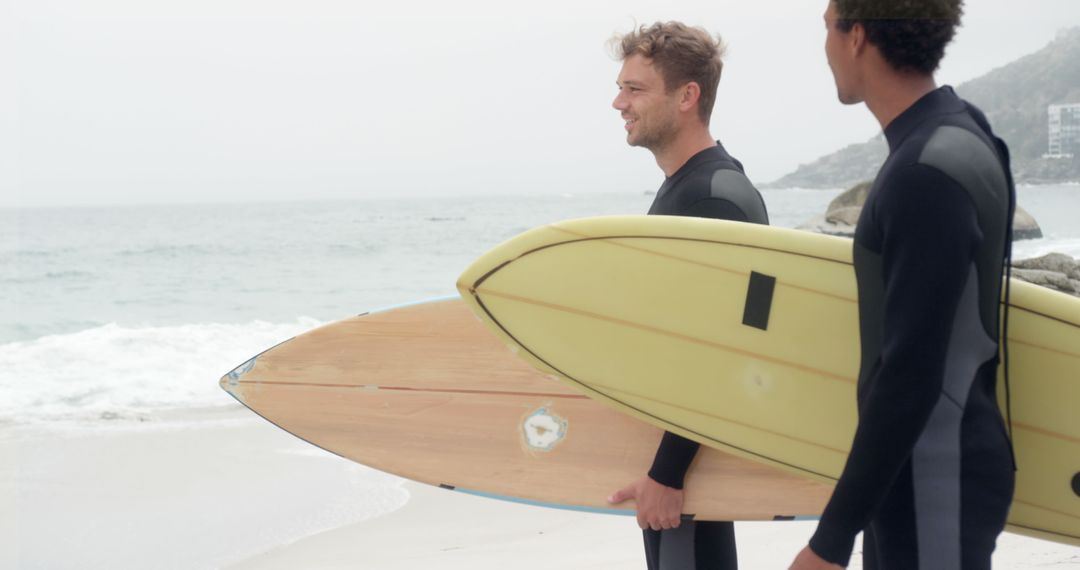 Surfers Preparing for Ocean Waves at Scenic Beach