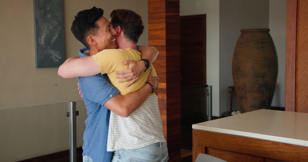 Joyful Gay Couple Embracing Affectionate Bond at Home