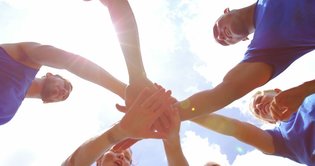 Team Huddle Under Clear Sky Creating Unity and Collaboration - Free Images, Stock Photos and Pictures on Pikwizard.com