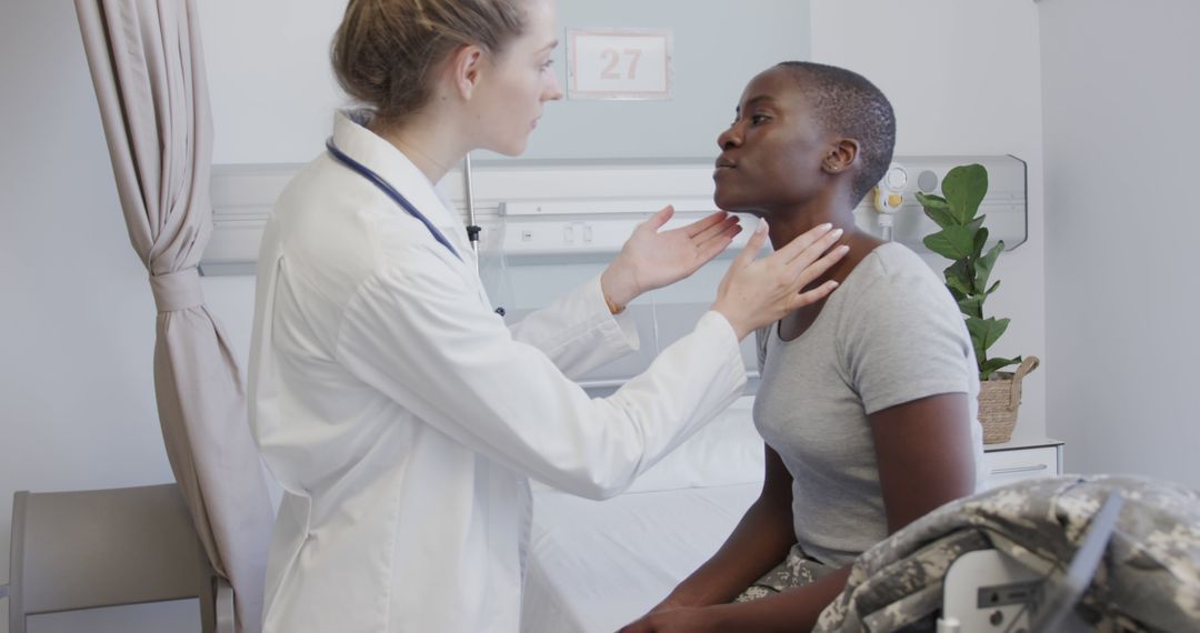 Doctor examining soldier patient in hospital room - Free Images, Stock Photos and Pictures on Pikwizard.com