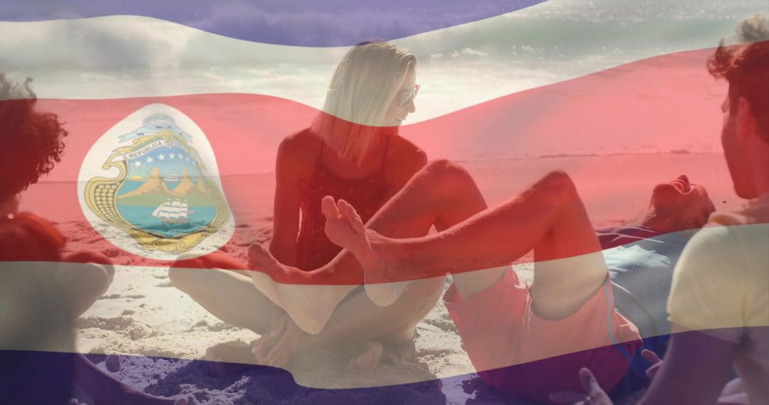 Group of Friends Bonding While Relaxing on Beach Under Costa Rica Flag