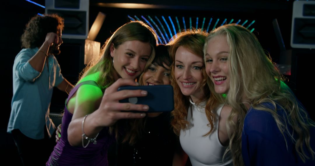 Group of Happy Friends Taking Selfie at Nightclub - Free Images, Stock Photos and Pictures on Pikwizard.com