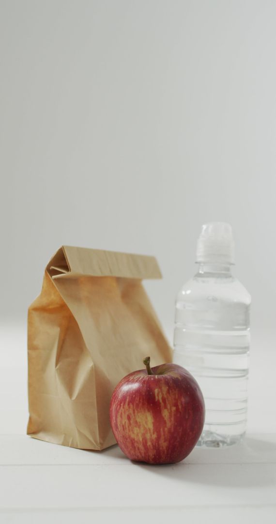 Healthy Packed Lunch with Apple and Water Bottle