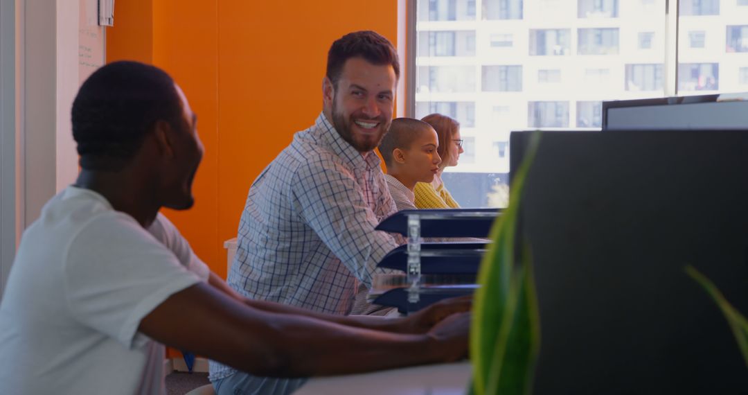 Business Colleagues Engaging in Modern Office Environment